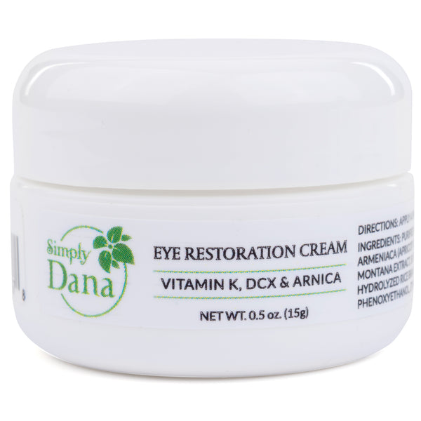 A jar of eye restoration cream by Simply Dana.
